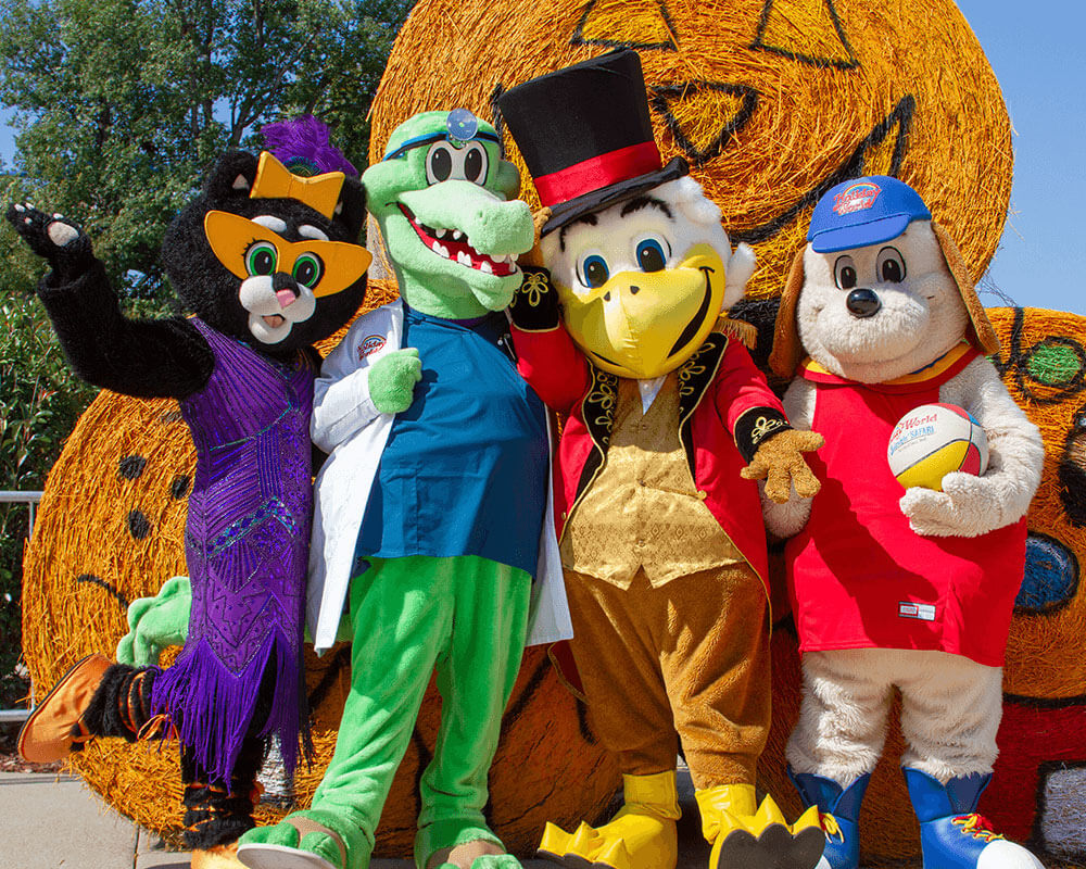 Holiday World & Splashin' Safari mascots Kitty Claws, Safari Sam, George the Eagle, and Holidog.