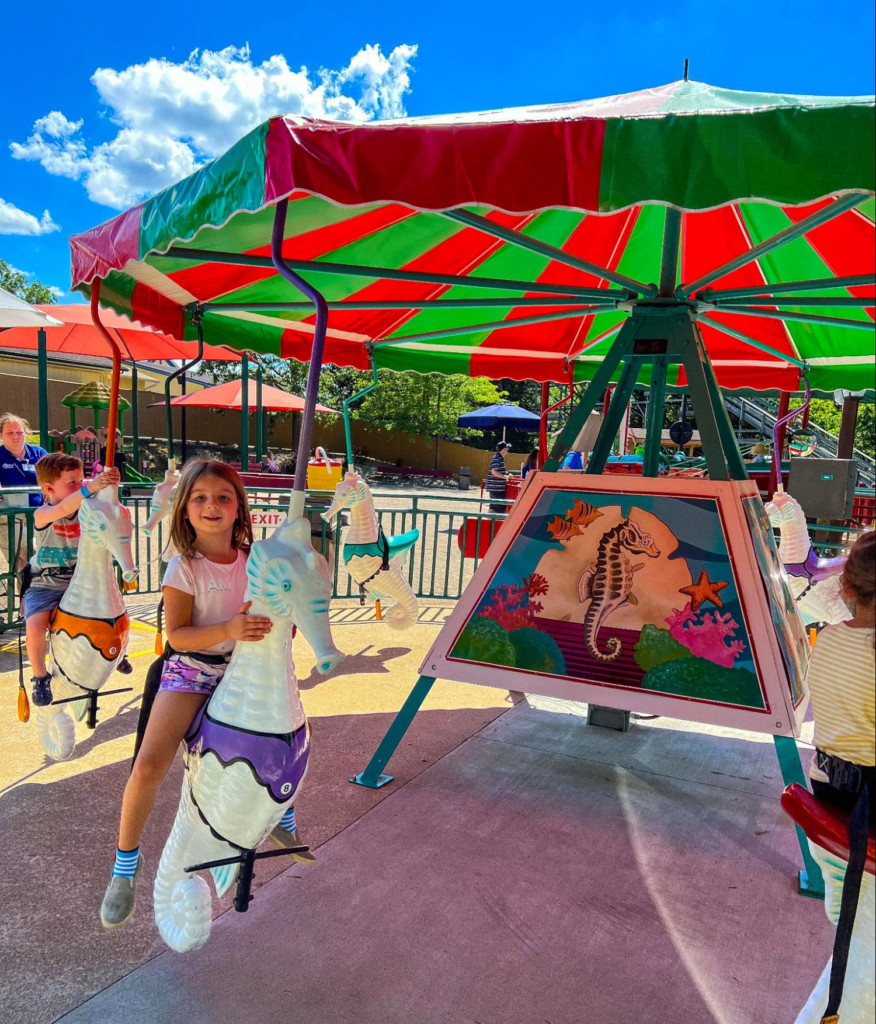 HoliBlogger Stephanie's daughter in Rudolph's Reindeer Ranch.