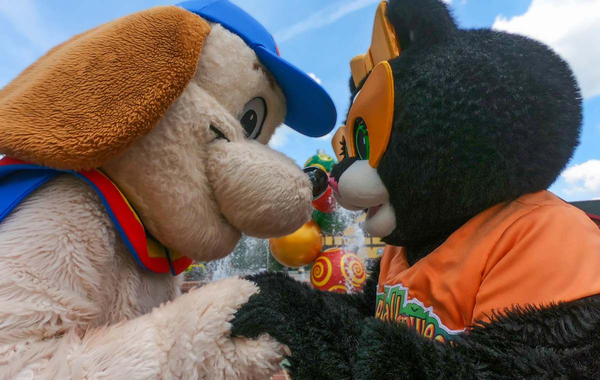 Holidog and Kitty Claws embracing