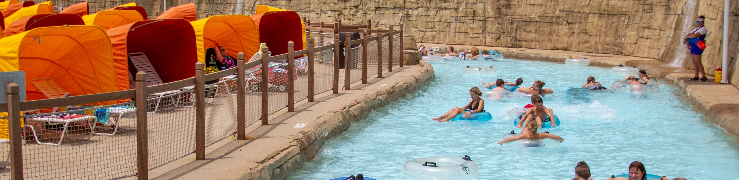 Cheetah Chaise Loungers mini-cabanas line the shore of the Bahari River lazy river at Holiday World & Splashin' Safari in Santa Claus, Indiana.
