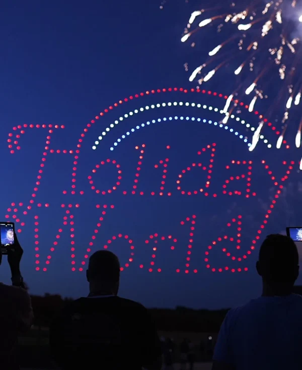 Drones make up the Holiday World logo as fireworks display during Holidays in the Sky.