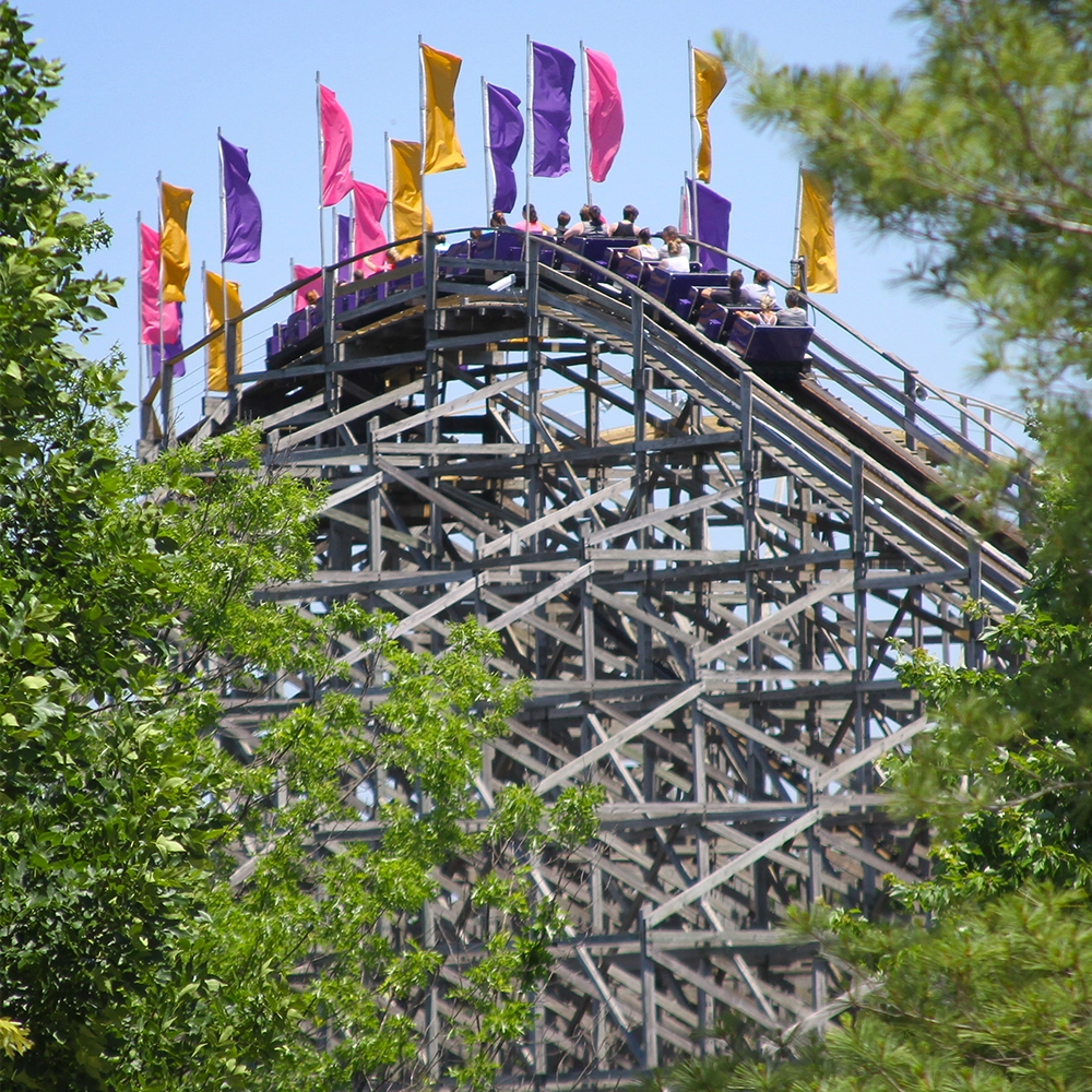 A train reaches the top of the lift hill on The Legend Wooden Roller Coaster at Holiday World & Splashin' Safari in Santa Claus, Indiana.