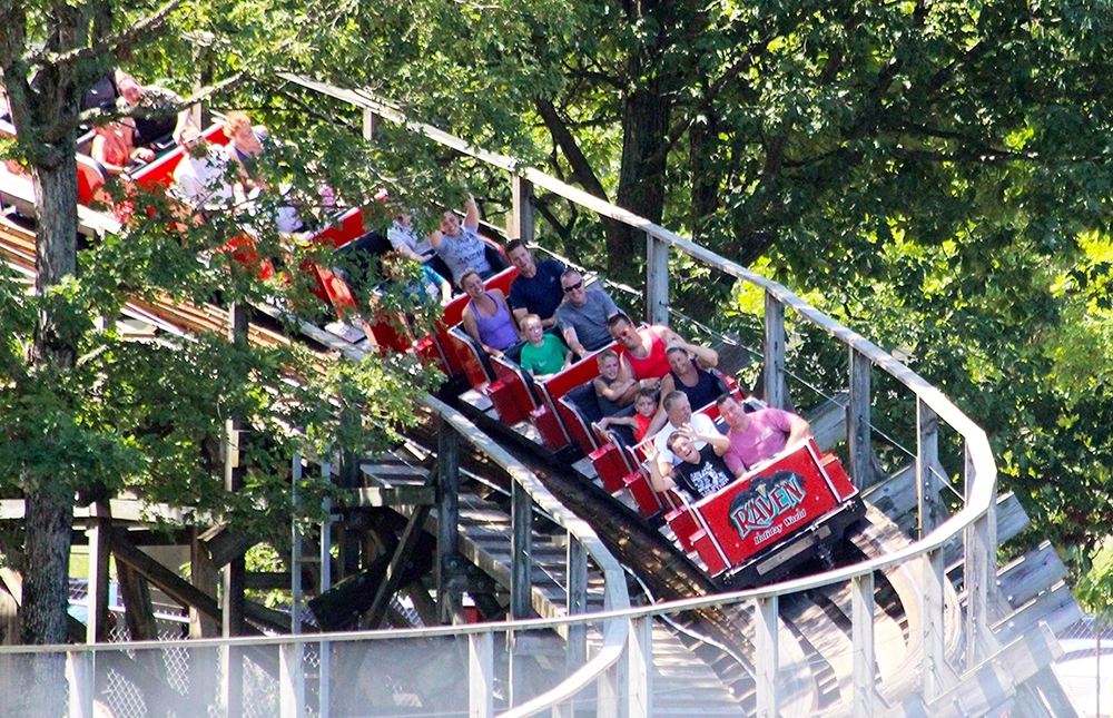 A train leading into a curve on The Raven at Holiday World & Splashin' Safari in Santa Claus, Indiana