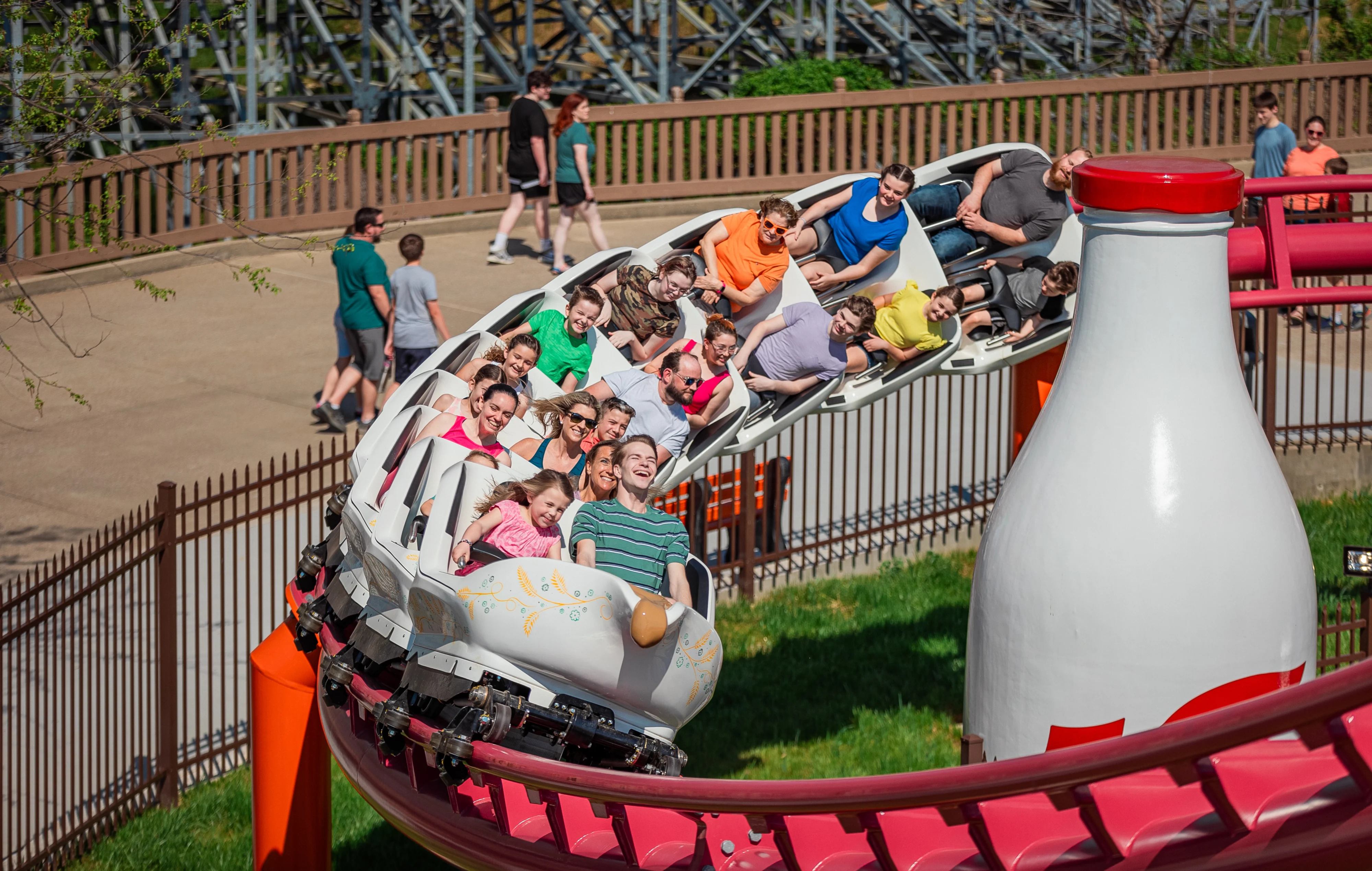 Good Gravy! Family Roller Coaster train coming around the milk bottle